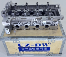 Головка блока цилиндров Monza 1.5 (L2B)  Uz-DW